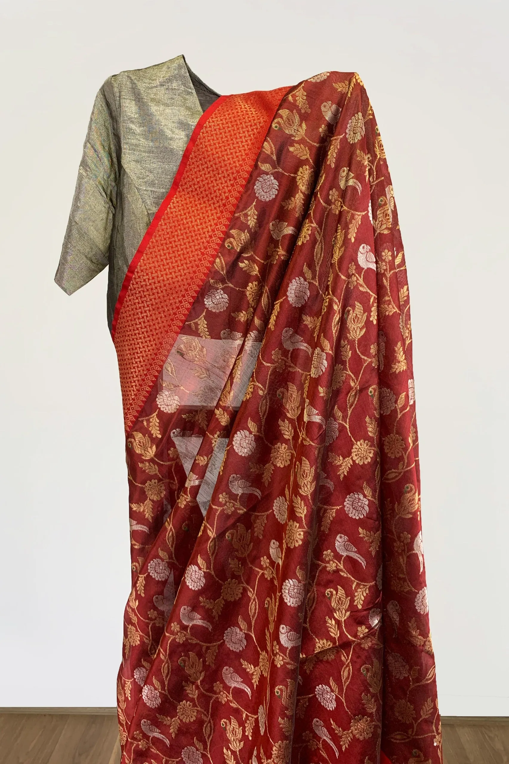 Dark orange silk sari with nature motif