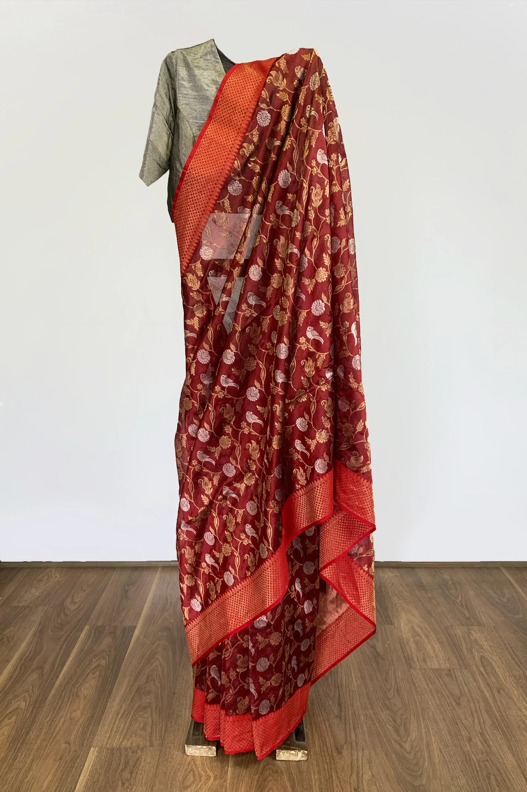 Dark orange silk sari with nature motif