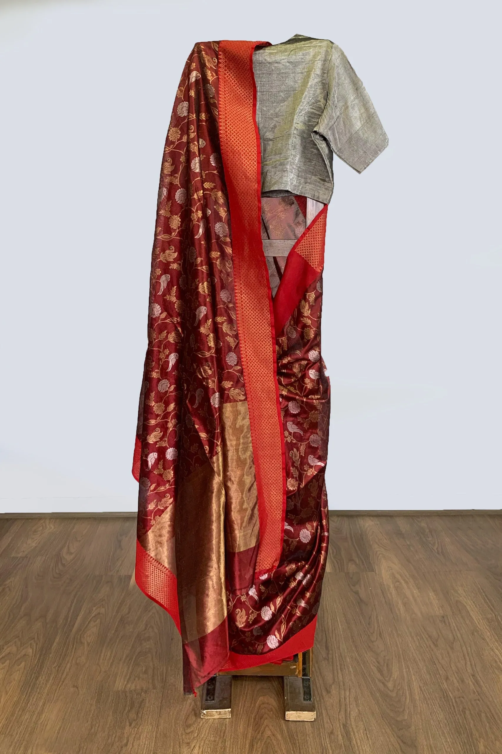 Dark orange silk sari with nature motif
