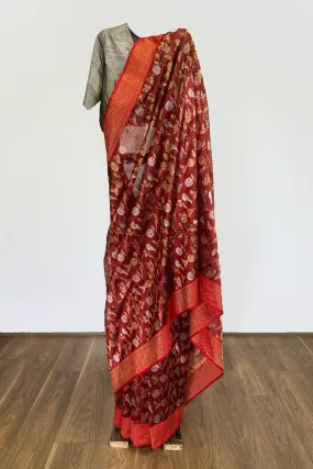 Dark orange silk sari with nature motif
